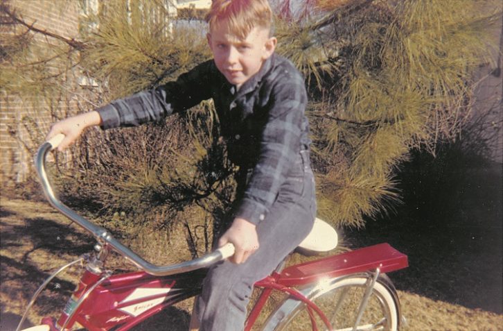 James O'Neal as a child on bicycle