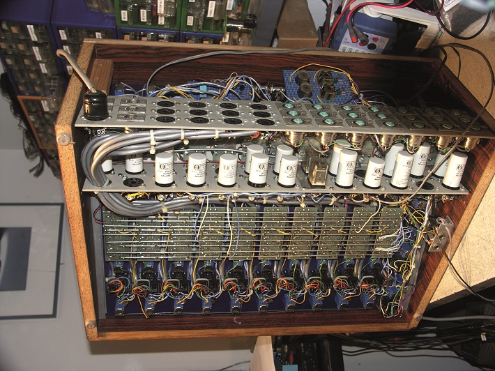 Fig. 2: caption: Inside, the cylindrical grey modules populated Hank’s console. 