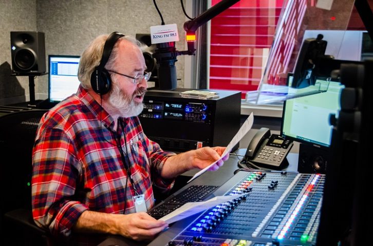 KING-FM host Dave Beck handles the inaugural live broadcast.