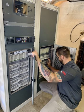 Jason Ornellas installing transmitter