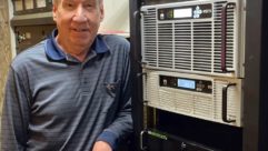 Mike Martin, KQAL, with Nautel transmitter