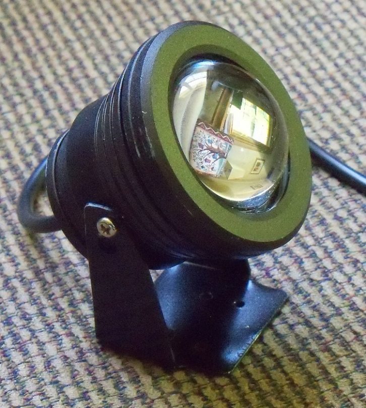 A small round LED floodlight.