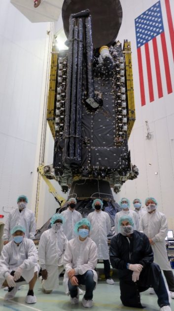 Maxar and SiriusXM employees pose for a photo with Maxar-built SXM-8 ahead of encapsulation in the fairing of SpaceX’s Falcon 9 rocket in Cape Canaveral, Fla. (Courtesy Maxar.)