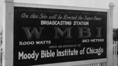 A historical photo of a WMBI sign
