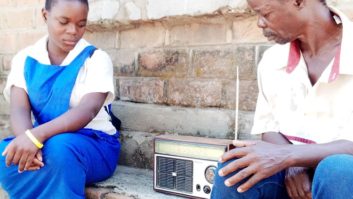 Mary Jasitini and her father from Mgomba village listen to the “Let’s Talk for Change” program on Nkhotakota Radio.