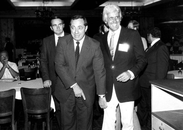 Mario Cuomo jokes with Bill O'Shaughnessy about the latter's lack of socks