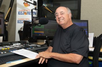 Jack Oliver is sitting in a radio studio
