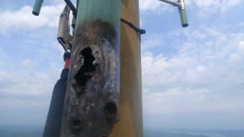 Photo of part of KKPT's FM broadcast antenna, badly damaged by an apparent lightning strike