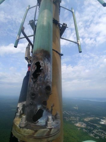 Photo of part of KKPT's FM broadcast antenna, badly damaged by an apparent lightning strike