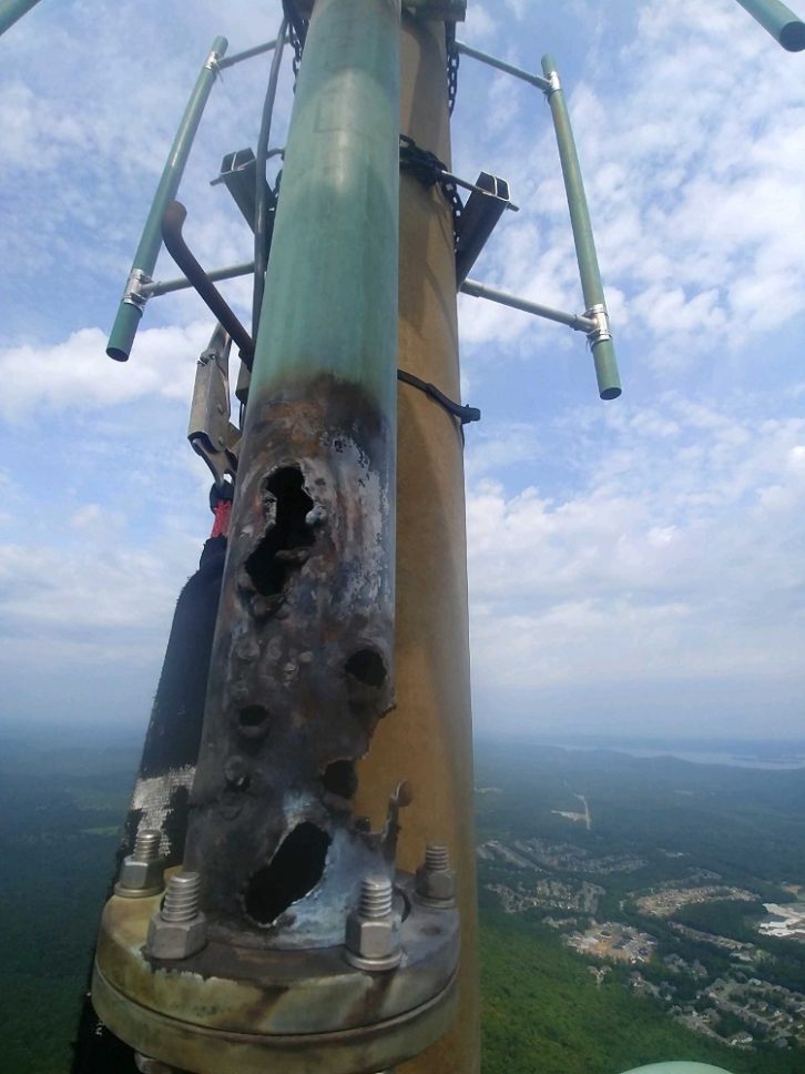 Photo of part of KKPT's FM broadcast antenna, badly damaged by an apparent lightning strike