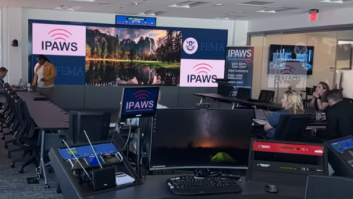 Image of the IPAWS technical support facility showing a room with monitors and technical work positions