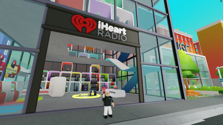 Screen shot of the iHeartLand Player Studio that recreates a storefront with the iHeart logo above the door