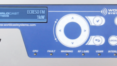 closeup of the front panel controls of a WorldCast Ecreso 1 kilowatt FM transmitter of the AiO series