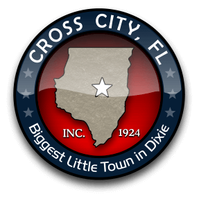 Logo of the town of Cross City, Fla., showing the county boundaries in a map