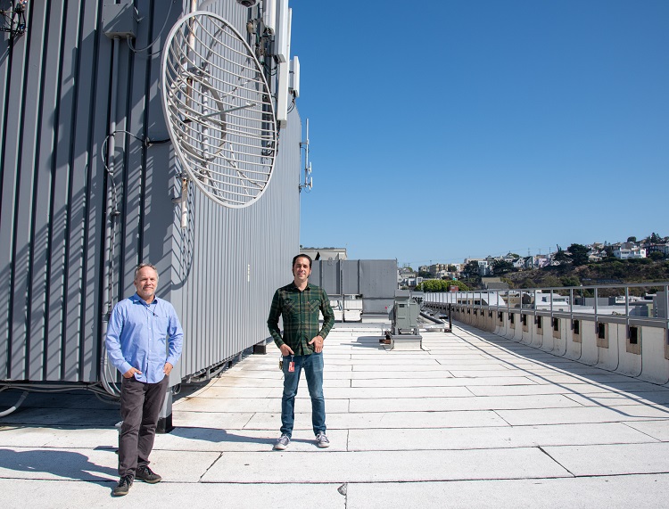 Dave Hansen and Donny Newenhouse stand on the roof of KQED’s San Francisco studios and headquarters. Photo: Kirsten Dalldorf /KQED