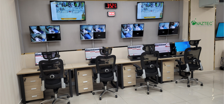 Some of the work areas in the master control room at Makkah City. 