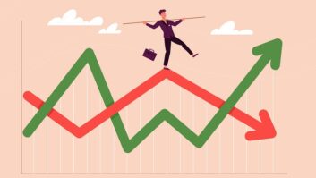 Cartoon of a man walking the tightrope of upward and downward revenue forecasts on a chart
