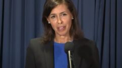 FCC Chai8rwoman Jessica Rosenworcel at the podium of the National Press Club