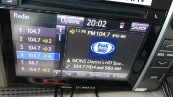 A radio in a 2014 Toyota Tundra is shown tuned to the HD4 channel that was enabled by MP11.