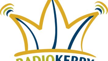 Logo of Radio Kerry with a stylized crown in gold and blue