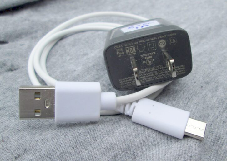 Unreadable small print, along with the dollar store adapter.
