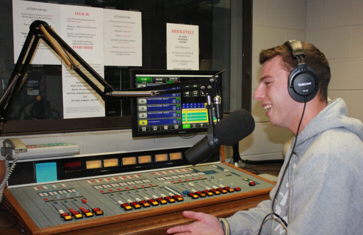 Student Hayden Coker with the WLJS equipment.