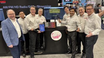 With Paul McLane, at left, are Inovonics' Andrew Cardema, Ben Barber, Earl Sondreal, Josh McAtee, Mukesh Chaudhary, Zach Calden, Gary Luhrman.