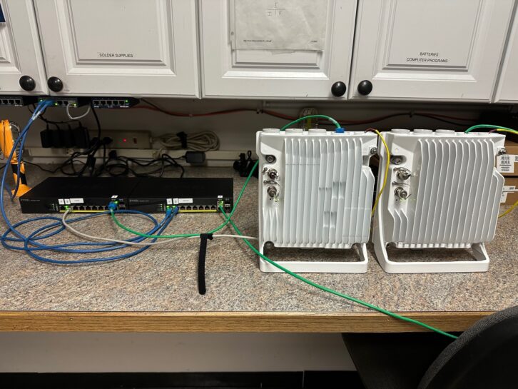 My workbench VLAN setup of the two Zyxel switches and a Cambium link. Port 1 of the switches was Zetta, port 2 was Wheatnet, and port 10 was a trunk port between the Cambium radios.