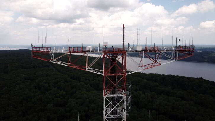 Antennas atop the Armstrong Tower. The Armstrong Tower, towering above the trees. Credit: David Amundsen, K2 Communications
