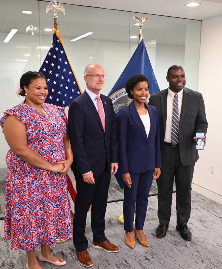 Left to right: Angela Trusty, sister of Olivia, Chairman Brendan Carr, Olivia Trusty, T.J. Trusty, brother of Olivia, with mother Ellen on the phone.