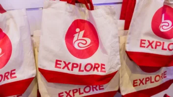 Closeup photo of cloth satchel bags bearing the IBC show logo