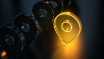 GPS symbol concept background. GPS icon glowing on dark background. Evolution of location tracking and targeting