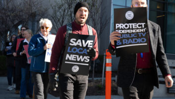 People participate in a rally to call on Congress to protect funding for US public broadcasters, Public Broadcasting Service (PBS) and National Public Radio (NPR), outside the NPR headquarters in Washington, DC, on March 26, 2025. President Donald Trump said on March 25 that he would "love" to cut funding for the US public broadcasters, which reportedly will be reviewed by Elon Musk's Department of Government Efficiency this week. (Photo by SAUL LOEB / AFP) (Photo by SAUL LOEB/AFP via Getty Images)