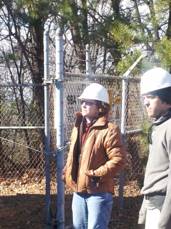 Hutter Cavell in an undated photo, working in the field on a microwave project.