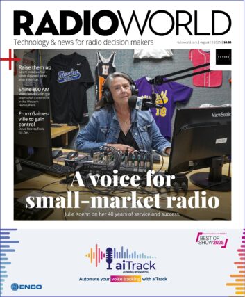 A woman sits in a radio studio behind the microphone, wearing headphones.