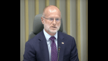 Carr at open meeting in August.