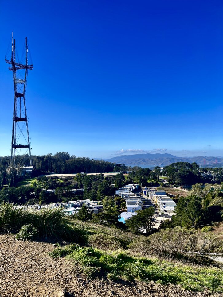 From Twin Peaks, Sutro Tower shines above San Francisco on a blue sky day. Credit: Cody Hmelar 