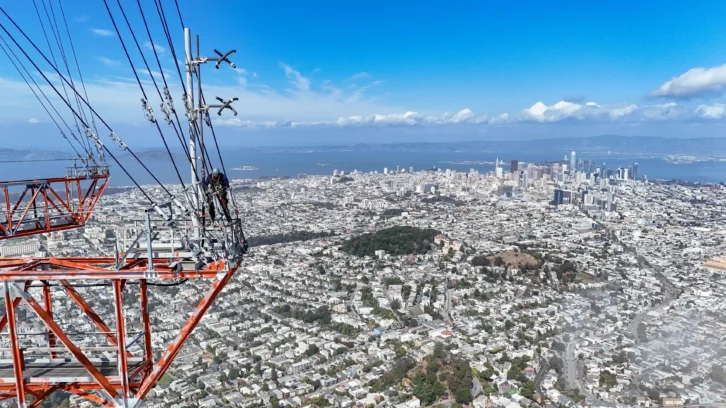 Caption: 96.5 KOIT(FM), 98.9 KSOL(FM), 104.5 KNBR(FM) and translator 93.7 K229DD(FX) transmit atop Sutro Tower from separate antennas. A Dielectric DCR-S antenna is visible here; ERI and Jampro antennas are also used. Credit: Explore Sutro Tower 