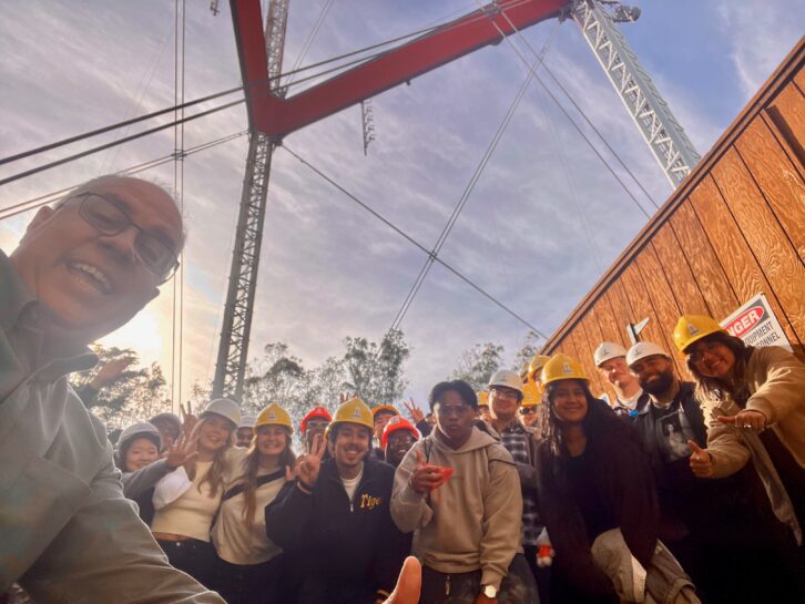 San Francisco State University professor Elaine Leung brought her “Intro to Radio & Podcasting” students to the tower, where they posed with Raul Velez, Sutro’s general manager. Credit: Elaine Leung