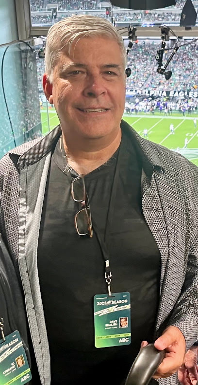 Skalish assists prior to a Philadelphia Eagles game broadcast during the 2022 season. The 94.1 FM frequency has been the flagship station for the team’s broadcast network since 1992.