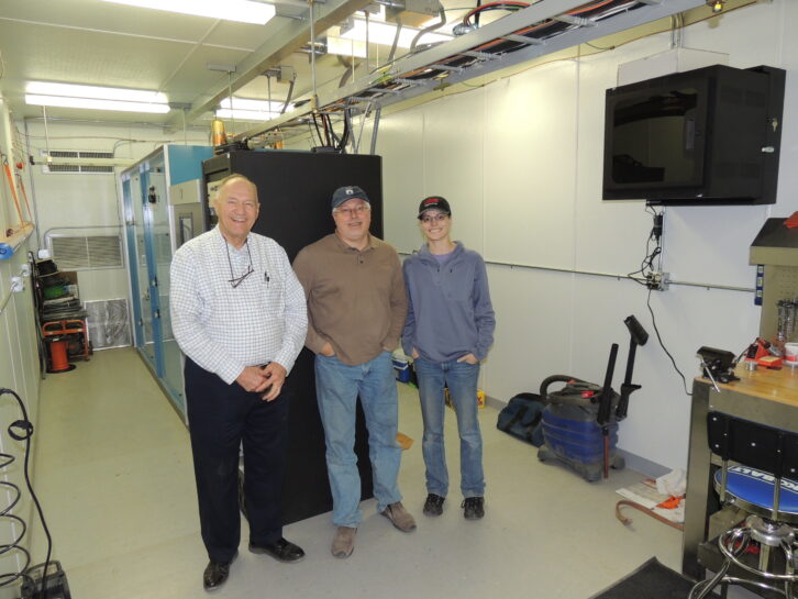 Don Jones, left, assisted Cris Alexander, center, and Amanda Hopp, right, at the KBRT(AM) Oak Flat, Calif., transmitter site as Crawford Broadcasting was tuning up the array and getting it ready to go on the air in January 2013.