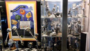 Geoffrey Hacker's glass-enclosed mic collection.