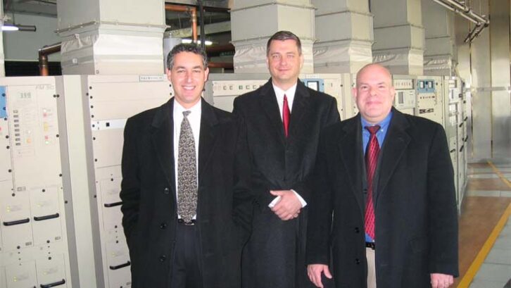 Jeff Detweiler, right, with FCC Media Bureau Chief Al Shuldiner and iBiquity Digital VP Scott Stull in China.