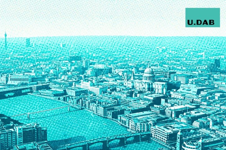 A photo of the North London skyline taken from height, and tinted blue