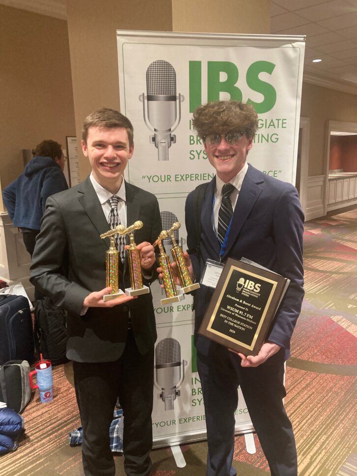 UW student members Vincent Hesprich, sports director, and Johnny Raider, production director