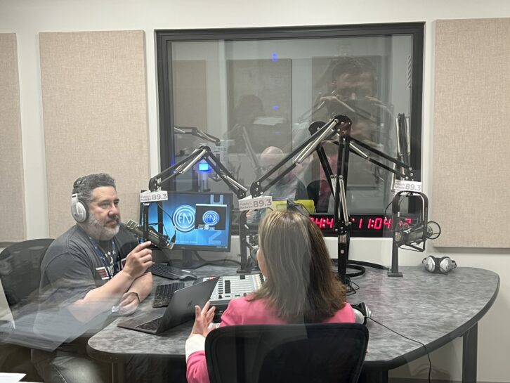 OSM CEO Pam Johnston is interviewed by morning host Luis Hernandez in the multipurpose production studio on the first day at the consolidated facility.