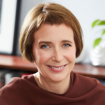 Christy Tanner sits in a brightly lit room