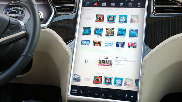 TuneIn displayed in a Tesla.
