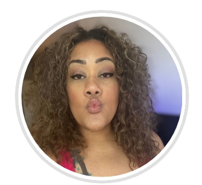 Media personality Ashlee Young makes a kissing face at the camera