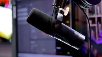 Professional Recording Setup Featuring a Black Microphone Mounted on a Stand